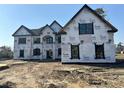 New construction home showcasing the exterior framing and window installation at 7053 Byrnes Ln., Myrtle Beach, SC 29588