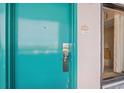 Teal condo entry door with keypad and non-smoking notice at 2207 S Ocean Blvd. # 1119, Myrtle Beach, SC 29577