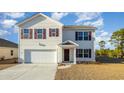 Two-story house with white siding, burgundy shutters, and a two-car garage at 3488 Ashridge Way, Conway, SC 29526