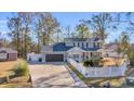 Two-story house with attached garage and fenced yard at 404 Cedar Run Dr., Myrtle Beach, SC 29588