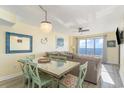 Charming dining area with seating for six, with ocean views and beach-inspired decor at 4103 N Ocean Blvd. # 504, North Myrtle Beach, SC 29582
