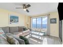 Living room with ocean view and comfortable seating at 4103 N Ocean Blvd. # 504, North Myrtle Beach, SC 29582