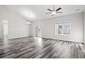 Spacious living room with vinyl plank flooring and access to a back patio at 4204 Summitt Trail, Myrtle Beach, SC 29579