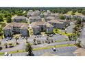 Aerial view of community, showing multiple buildings and parking at 4725 Wild Iris Dr. # 202, Myrtle Beach, SC 29577