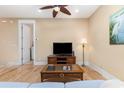 Relaxing living room with hardwood floors, a sofa, and a view into another room at 4919 Cinzia Ln. # 6-B, North Myrtle Beach, SC 29582