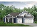 New home with a three-car garage and blue exterior at 536 Sheepbridge Way, Loris, SC 29568