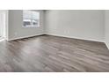 Spacious living room with gray tone vinyl plank flooring at 708 Canton St., Conway, SC 29526