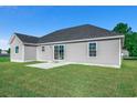 Rear view of house with sliding glass doors and patio at Tbd Hodges Rd., Conway, SC 29527