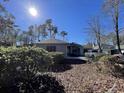 Ranch style home with a large yard at 1818 Topsail Ln., North Myrtle Beach, SC 29582