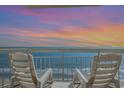 Stunning ocean and sunset views from this condo's private balcony with seating at 1012 N Waccamaw Dr. # 1204, Garden City Beach, SC 29576