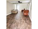 Living room with hardwood floors and comfy seating at 109 Plum Ln., Andrews, SC 29510