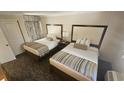 Bedroom with two double beds and updated furnishings at 1105 S Ocean Blvd. # 236, Myrtle Beach, SC 29577