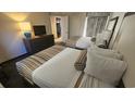 Bedroom with two double beds and access to kitchen at 1105 S Ocean Blvd. # 236, Myrtle Beach, SC 29577