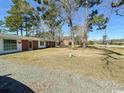Landscaped yard with mature trees at 11253 Old Pee Dee Rd., Hemingway, SC 29554