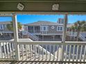 View of beach house from another house's porch at 299 Lake Arrowhead Rd., Myrtle Beach, SC 29572