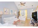 Light and airy living room featuring hardwood floors and white sofas at 306 River Rock Ln. # 1304, Murrells Inlet, SC 29576