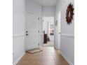 Clean hallway with tile flooring and access to various rooms at 4520 Lighthouse Dr. # 29-B, Little River, SC 29566