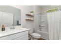 Clean bathroom with white vanity, bathtub and shower at 7093 Shooting Star Way, Myrtle Beach, SC 29579