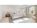 Bright bedroom with a large bed and window at 7097 Shooting Star Way, Myrtle Beach, SC 29579