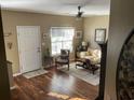 Bright living room with hardwood floors and comfy seating at 804 Brenda Pl., Myrtle Beach, SC 29577