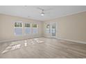 Spacious living room with hardwood floors and lots of natural light at 143 Crane Dr. # A, Pawleys Island, SC 29585