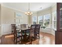 Spacious dining room with hardwood floors and large windows at 144 Shenandoah Dr., Murrells Inlet, SC 29576