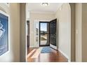 Bright entryway with hardwood floors and view to backyard at 144 Shenandoah Dr., Murrells Inlet, SC 29576