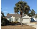 Charming one-story home features a well-maintained lawn, attached garage, and classic curb appeal in a tranquil neighborhood at 179 Wiltshire Ct., Longs, SC 29568