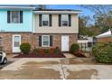 Attractive two-story townhouse with a golf cart at 214 13Th Ave. S # C, Surfside Beach, SC 29575