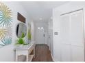 Clean and spacious entryway with a console table and built-in storage at 306 Westbury Ct. # 2-A, Myrtle Beach, SC 29572