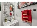 Stylish powder room featuring a modern sink and red towels at 324 Golan Circle # B, Myrtle Beach, SC 29579