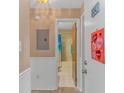 Simple entryway with access to the bathroom at 3700 Golf Colony Lane # 20-L, Little River, SC 29566