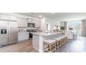 Modern kitchen with stainless steel appliances and an island at 547 Firouz Dr, Longs, SC 29568