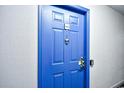 Blue condo entry door with keyless entry at 5905 South Kings Hwy. # 6310-D, Myrtle Beach, SC 29575