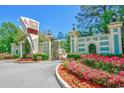 Resort entrance with gated entry and landscaping at 5905 South Kings Hwy. # 6310-D, Myrtle Beach, SC 29575