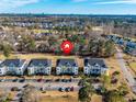 Complex of three-story condo buildings near a golf course at 612 River Oaks Dr. # 55-C, Myrtle Beach, SC 29579