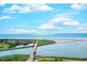 Aerial view of beach, boardwalk, and waterways at 101 Ocean Creek Dr. # Ee8, Myrtle Beach, SC 29572