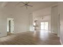 Spacious open-concept living space with light wood floors, white walls, recessed lighting, and modern fixtures at 104 Willow Ridge Rd., Myrtle Beach, SC 29588