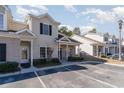 Exterior view of townhouses with parking at 107 Maddux Ln. # E, Myrtle Beach, SC 29588