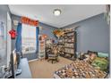 This bedroom has carpet flooring, a desk, a gaming chair and plenty of space at 1240 Pineridge St., Conway, SC 29527