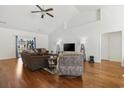 Bright living room with hardwood floors, vaulted ceiling, and ample natural light at 129 Yeomans Dr., Conway, SC 29526