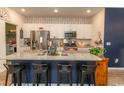Modern kitchen with granite countertops and stainless steel appliances at 136 Timber Oaks Dr., Myrtle Beach, SC 29588