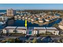 Aerial view of condo community near water, highlighting building location and pool at 1919 Spring St. # A-16, North Myrtle Beach, SC 29582