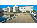 Condo building with water view and parking at 2225 Essex Dr. # F, Surfside Beach, SC 29575