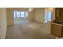 Spacious living room with carpeting and lots of natural light at 2276 Essex Dr. # K, Surfside Beach, SC 29575