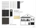 Two-story house with black and white exterior and balcony at 2426-A Park St., North Myrtle Beach, SC 29582