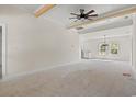 Bright living room featuring a ceiling fan, recessed lighting, and a view into the kitchen at 2428 Park St., North Myrtle Beach, SC 29582