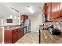 Modern kitchen with stainless steel appliances and granite countertops at 352 Beulah Circle, Conway, SC 29527
