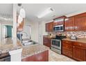 Modern kitchen with stainless steel appliances and granite countertops at 352 Beulah Circle, Conway, SC 29527