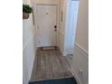 Light and bright entryway with wood-look floors at 4679 Wild Iris Dr. # 101, Myrtle Beach, SC 29577